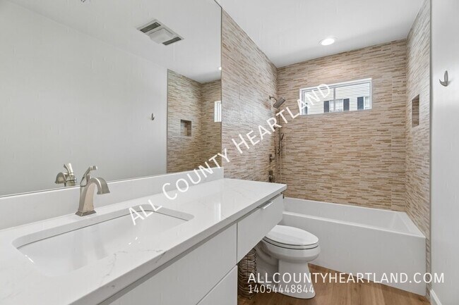 Building Photo - 9009 N May Ave