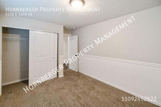 Building Photo - 6106 E 14th Ln