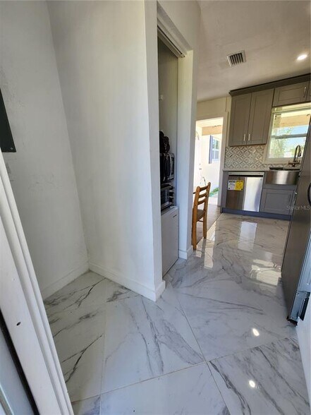 Backdoor entryway - 8010 Hyde Park Ave