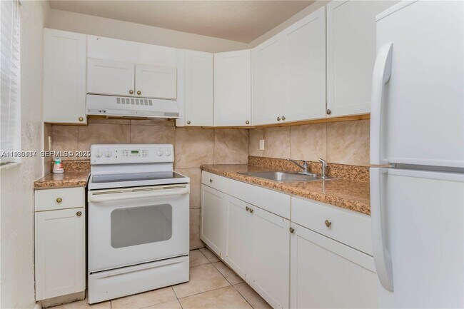 Building Photo - 1123 NW 27th Ave