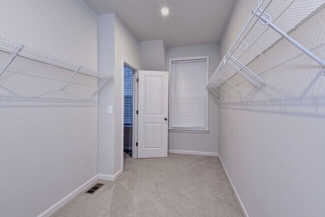 Building Photo - Three Story Brick End Unit with Rooftop Terrace