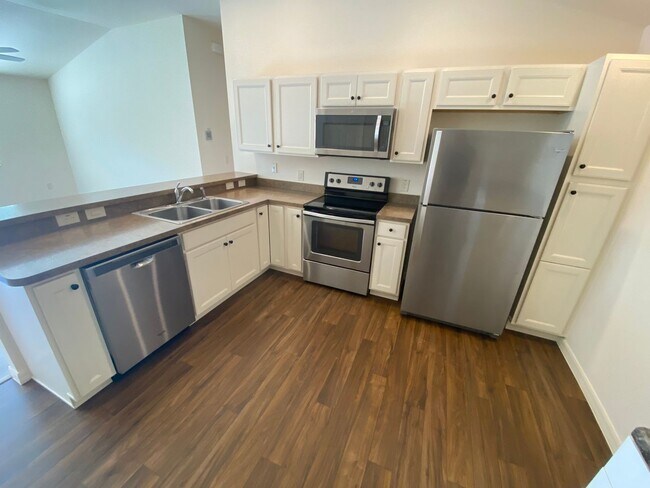 Building Photo - Resort Living in This UNFURNISHED Annual Rental in The Village of Fenny, Patio Villa, 2 bed, 2 bath.