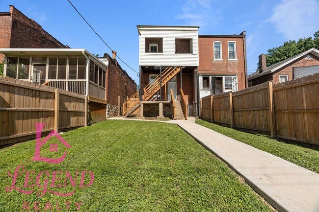 Building Photo - Completely Renovated 4BR Brick Home with 3 Full Baths & Off-Street Parking