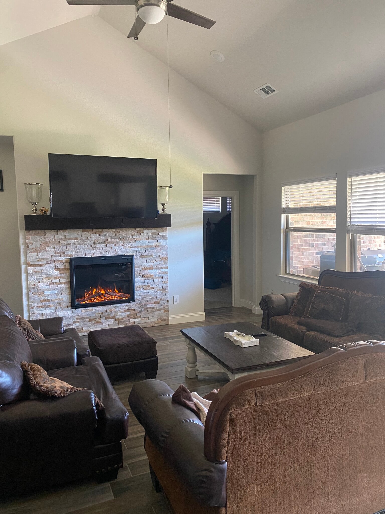 Living room view from the kitchen . Electric fireplace. - 120 Gardenia Dr