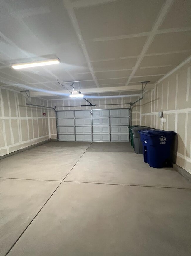 Building Photo - Welcome to modern living in a secure, gated community!