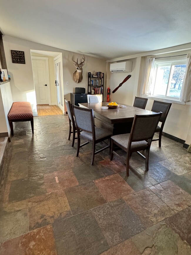 Dining room looking towards primary & backdoor - 92 E Rosebud Ave