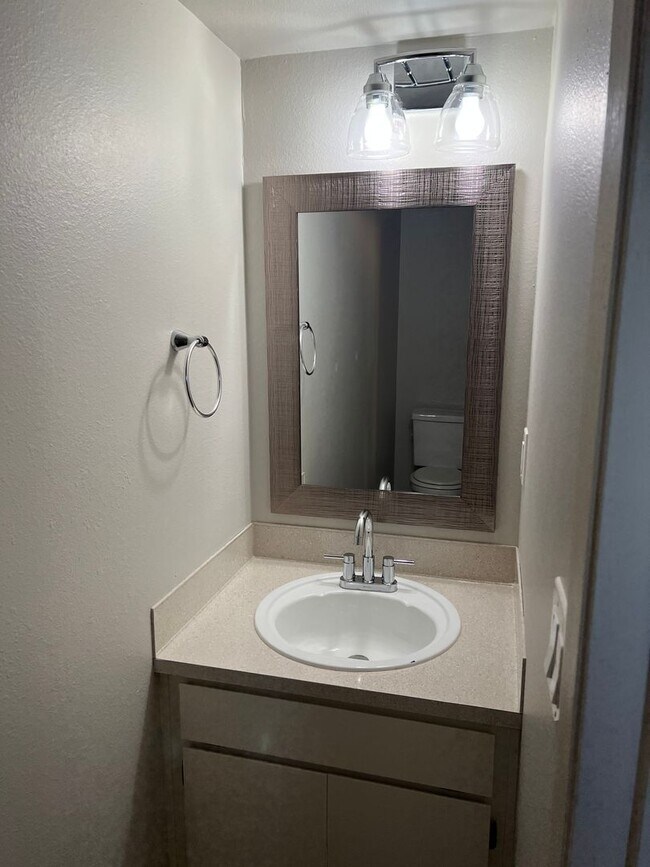 Building Photo - NEWLY REFRESHED Two Bedroom Townhome Style...