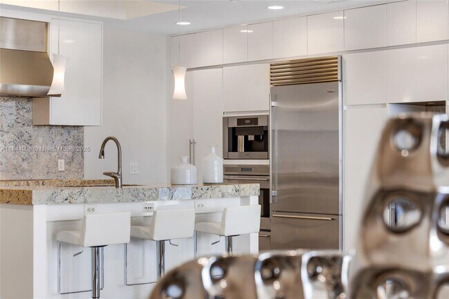Building Photo - 9705 Collins Ave
