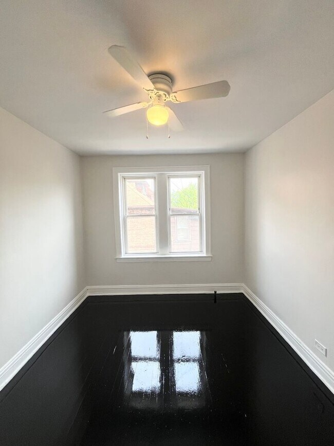 Building Photo - 4126 W 24th Pl