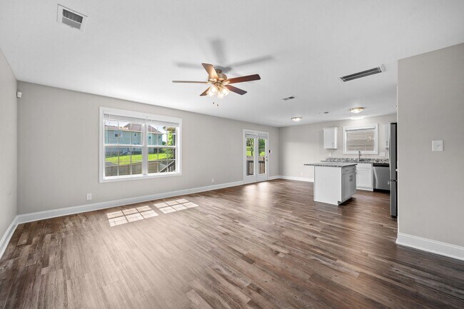 Building Photo - Beautiful Open-Concept Home with Covered Deck & Huge Backyard