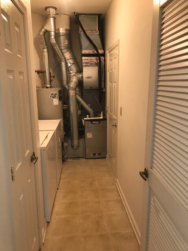 Garage Door into the Laundry Room - 12 Sunset Ln