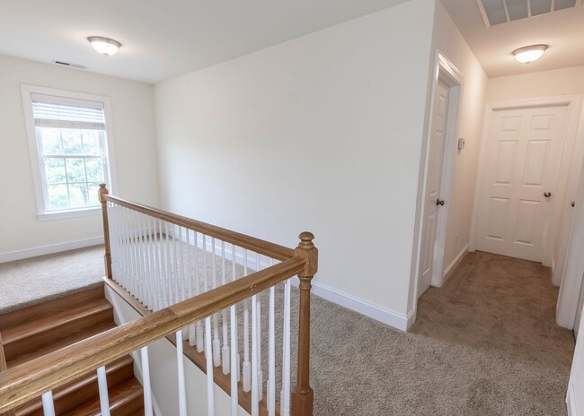 Building Photo - Huge house with vaulted ceilings and fenced in rear yard