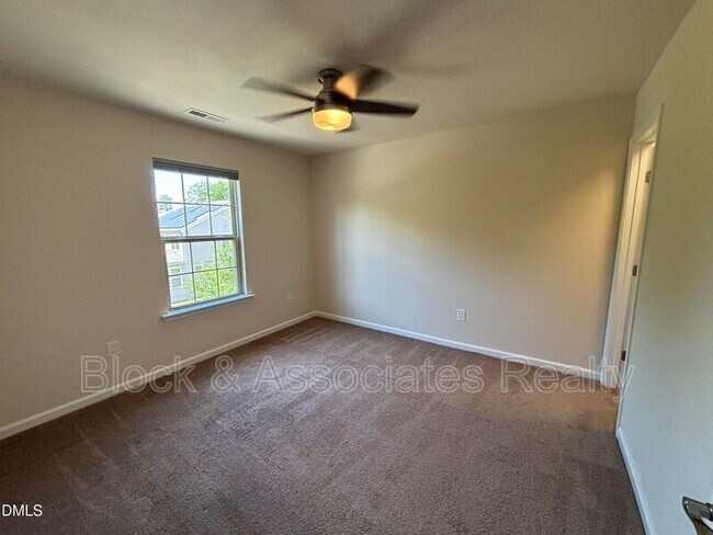 Building Photo - 1009 Magnolia Blossom Ln