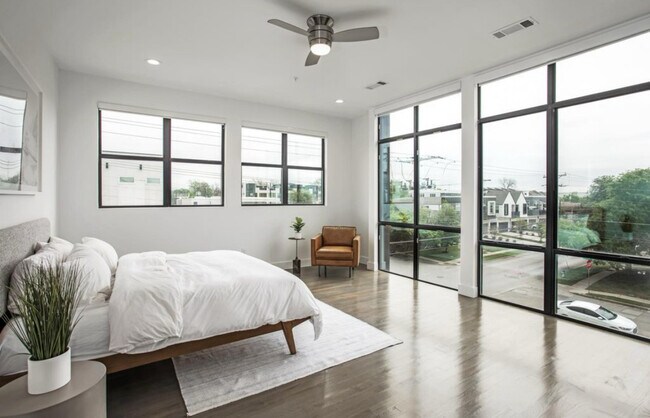 Master bedroom with floor to ceiling windows - 2307 N Carroll Ave