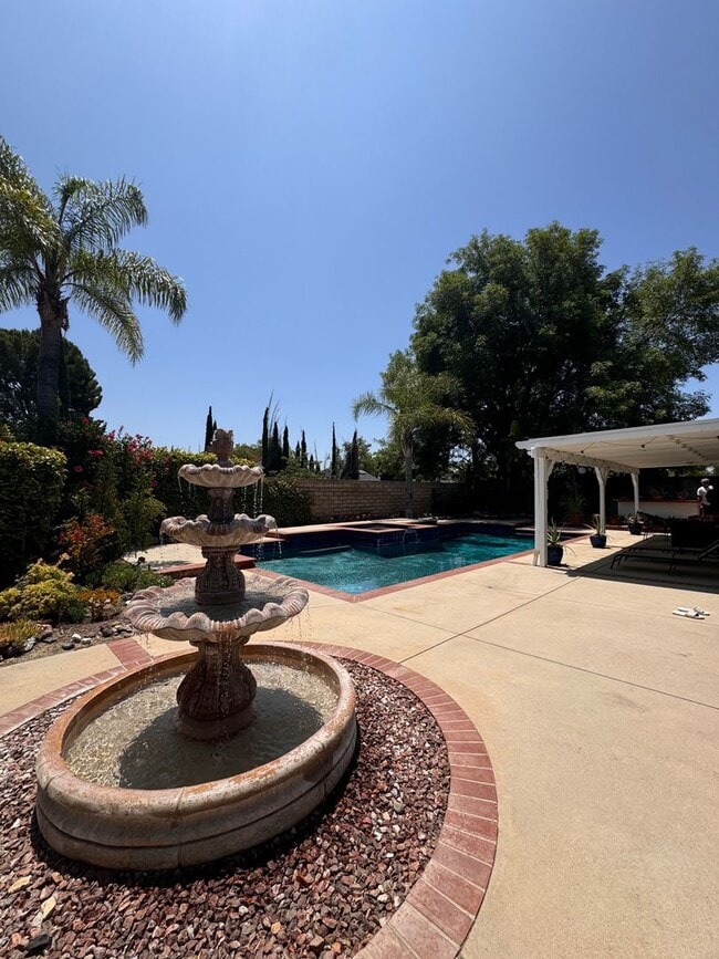 Building Photo - BEAUTIFULLY Updated Home with Pool+ Modern...