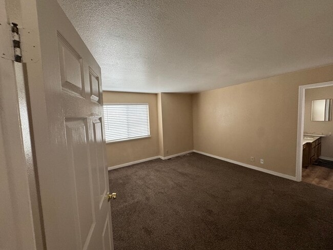 Building Photo - Welcome to your newly remodeled townhome!