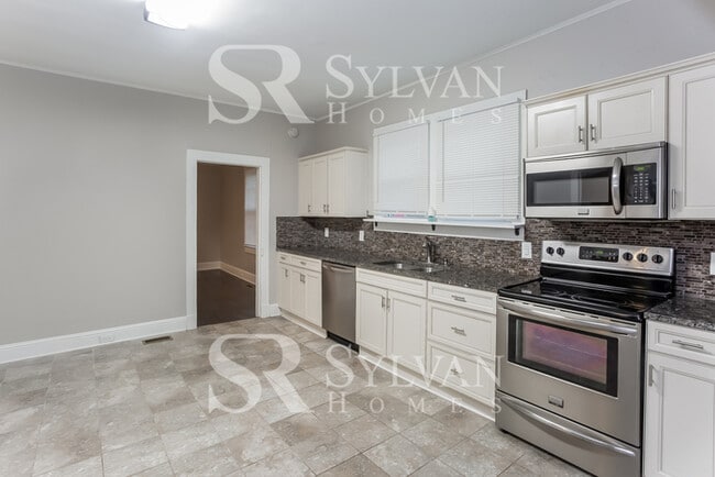 Building Photo - The ideal space to balance life, work, and play.