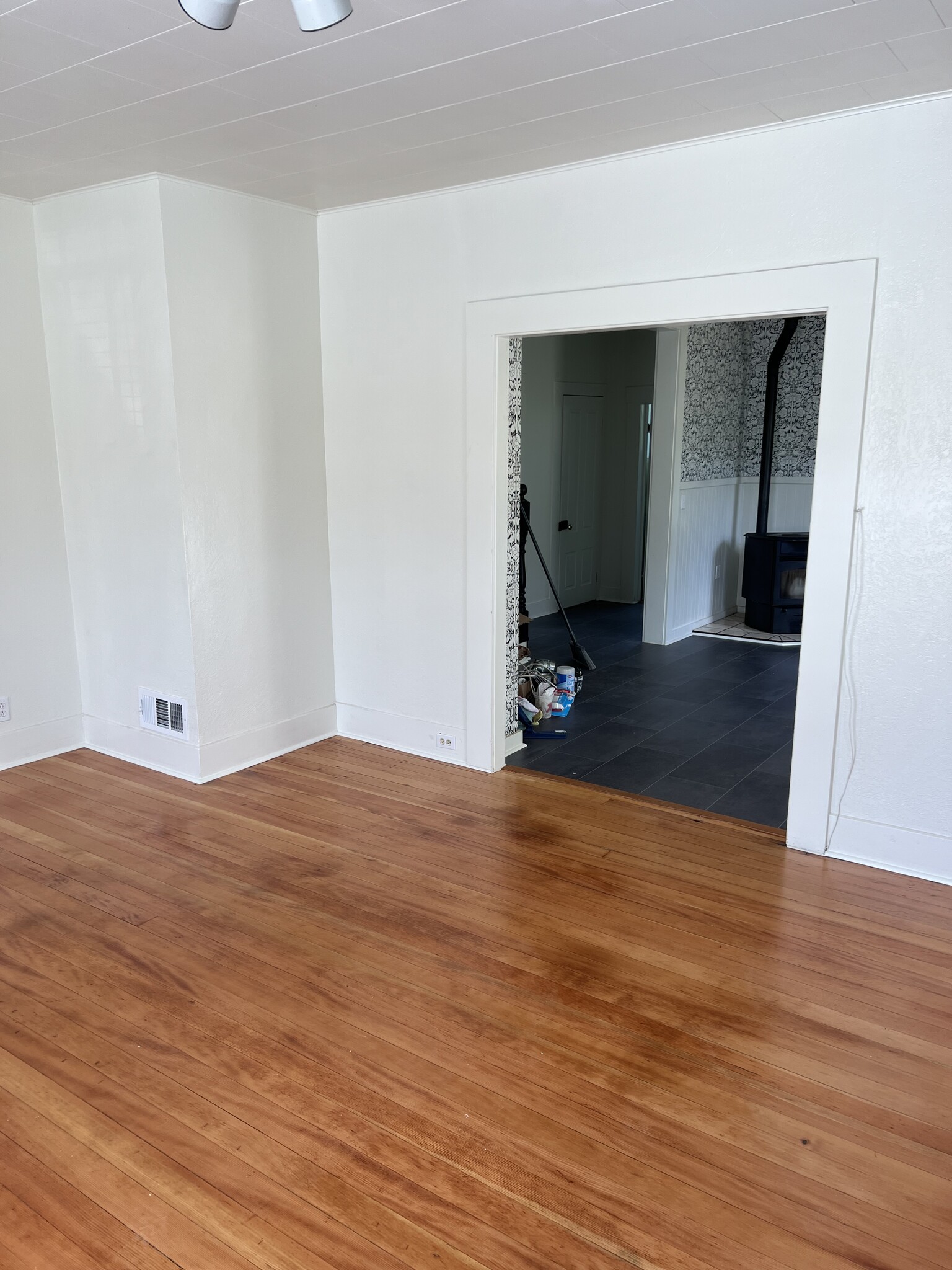 Living room looking into kitchen - 557 Washington St
