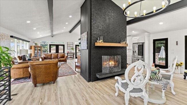Building Photo - Renovated Mid-Century Modern Home in Belmont West with Finished Basement & Fenced Yard
