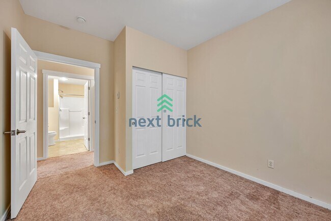Building Photo - Rare Ground-Floor, End Unit with massive b...