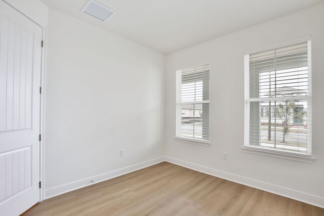 Building Photo - Gorgeous 4/3 Residence with a Private Back Lanai and a 2 Car Garage in the Delightful Laureate Pa...