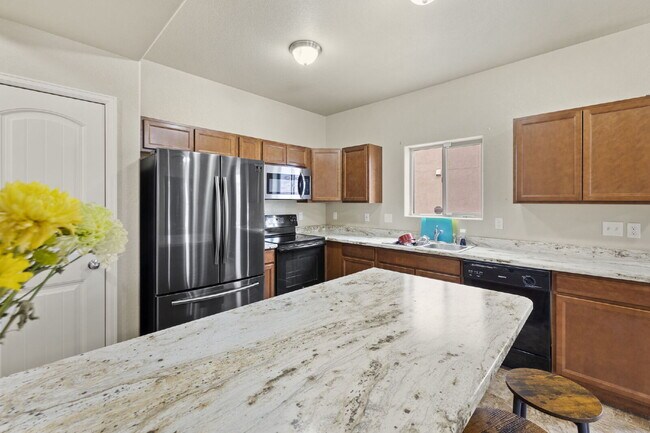 Building Photo - "Beautiful Townhome 3-Bedroom  2.5 Baths no carpet home, just 7 minutes from Fort Carson!"
