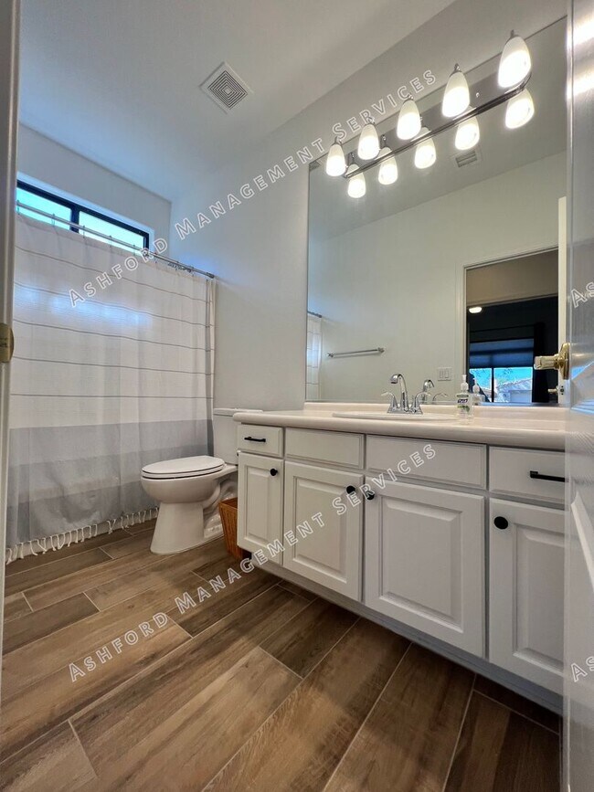 Building Photo - COME HOME TO LUXURY IN GATED GRAYHAWK GOLF...