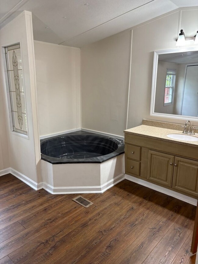Building Photo - Secluded Open Floor Plan Mobile Home