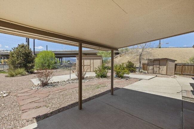 Building Photo - Updated 2 Bed + Bonus Workshop | Huge Backyard | Two Storage Sheds | Carport | Pet Friendly