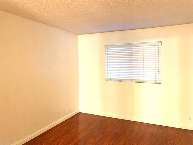 Building Photo - 2-Bedroom, 2-Bath Upstairs Condo Unit in Gated Pomona Community, Water/Trash/HOA Included!