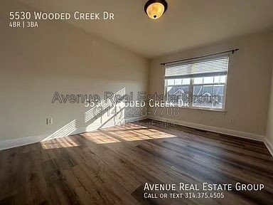 Building Photo - 5530 Wooded Creek Dr
