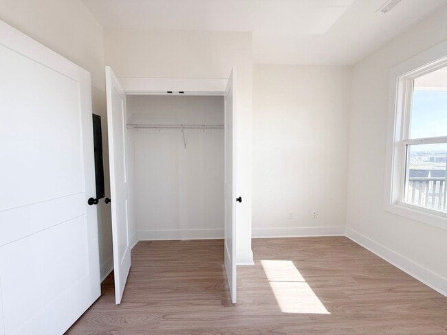 Building Photo - Available August 1: 4-Bedroom Townhome at Highbury + Summer Special Perks