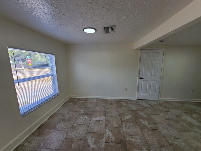 Building Photo - Stunning Corner-Lot Rental: 4BR/2BA with Courtyard