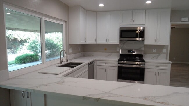 Building Photo - Beautiful Remodeled Single Story 4 BR 2 BA Home With 3 Car attached Garage