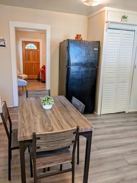 dining table and fridge - 60 Foss St