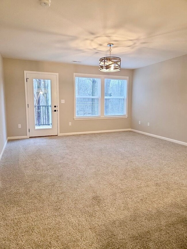 Building Photo - Exquisite just built condo with everything! Ground floor, no stairs, attached garage