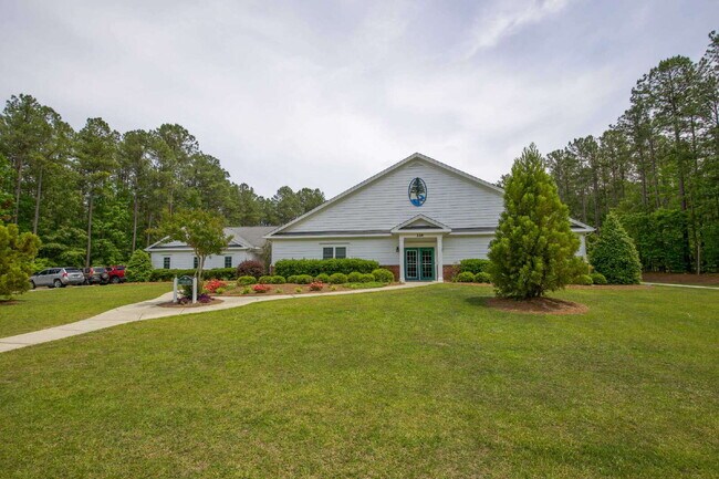 Building Photo - "Spacious 4-Bedroom Gem with 2.5 Baths at ...