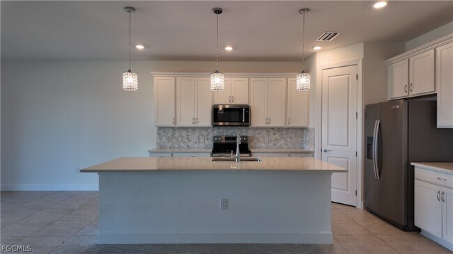 Building Photo - 3700 Passion Vine Dr