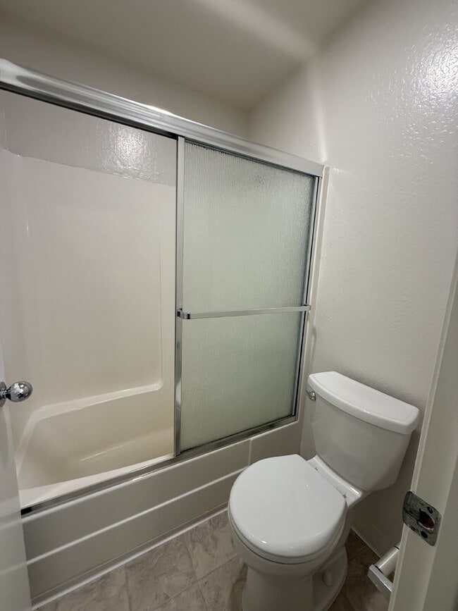 Building Photo - Spacious 3-Bedroom, 2-Bath Multi-Level Home with Balcony, In-Unit Laundry & Dual Parking