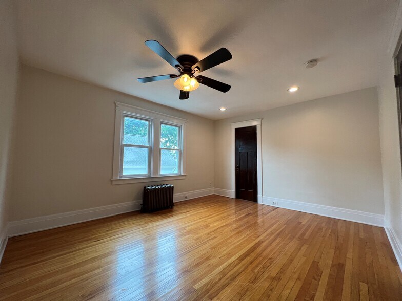 Master Bedroom: walk-in closet, ceiling fan, and recessed lights. - 61 Hirschfield Dr