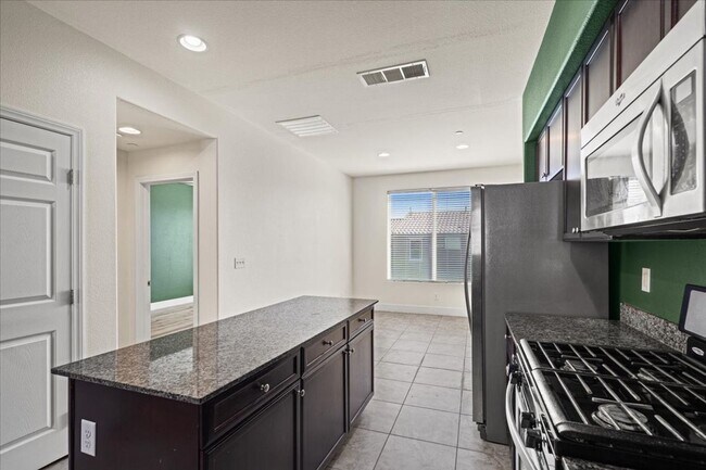 Building Photo - Stylish 4 Bedroom Retreat with Dual Primary Suites in Gated North Las Vegas Community