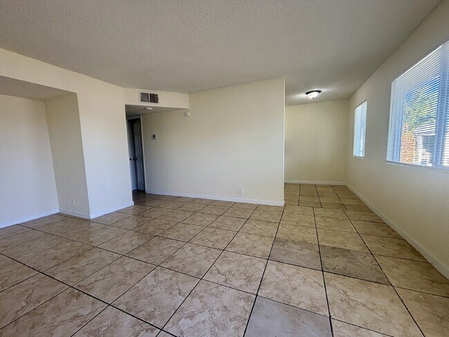 Building Photo - Freshly Painted 2-Bed with Full Utilities,...