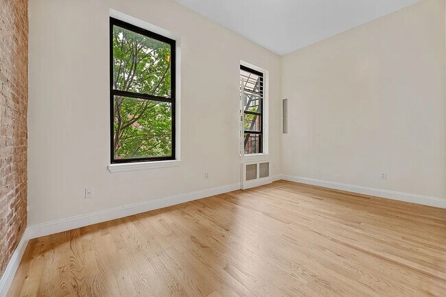 Building Photo - 63 East 125th Street