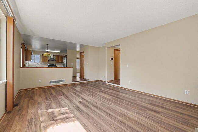 Building Photo - Spacious 5 Bedroom Home with Fenced Yard & 2 Car Garage