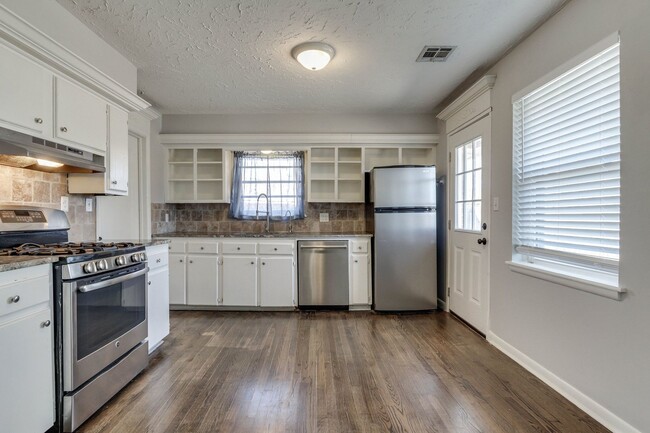 Building Photo - Three bed home in the heart of The Village