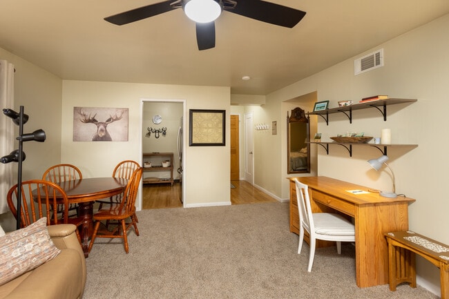 Large closet in entry with vacuum and broom - 1820 Fremont Ave