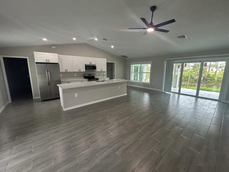 Building Photo - $1000 OFF THE FIRST MONTHS RENT: Available Now!! Brand New Construction 4/3