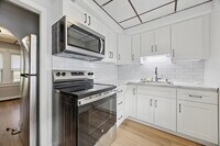 Building Photo - Bright and Airy 1-Bedroom with Private Ent...
