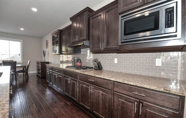 Building Photo - Gorgeous 4BR Home in Canton Park Backing t...