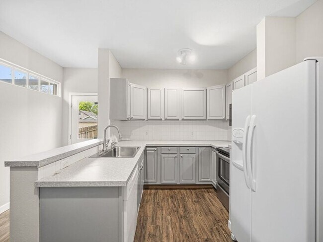 Building Photo - Stunning Updated Home in North Spokane | Bright Interiors, Modern Kitchen & Private Patio